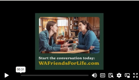 image of female adult and youth talking in a kitchen